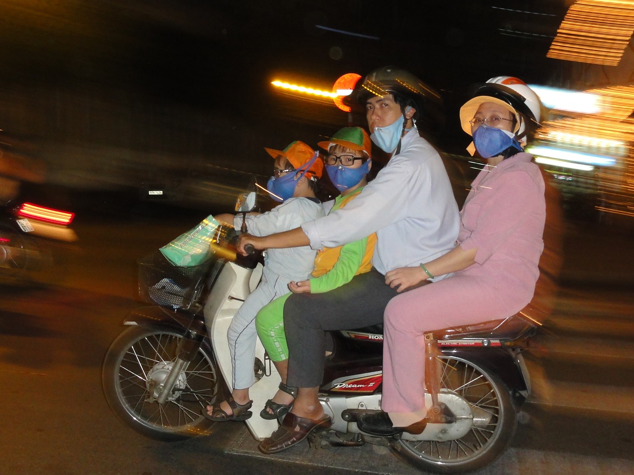 family motorcycle at night free photo