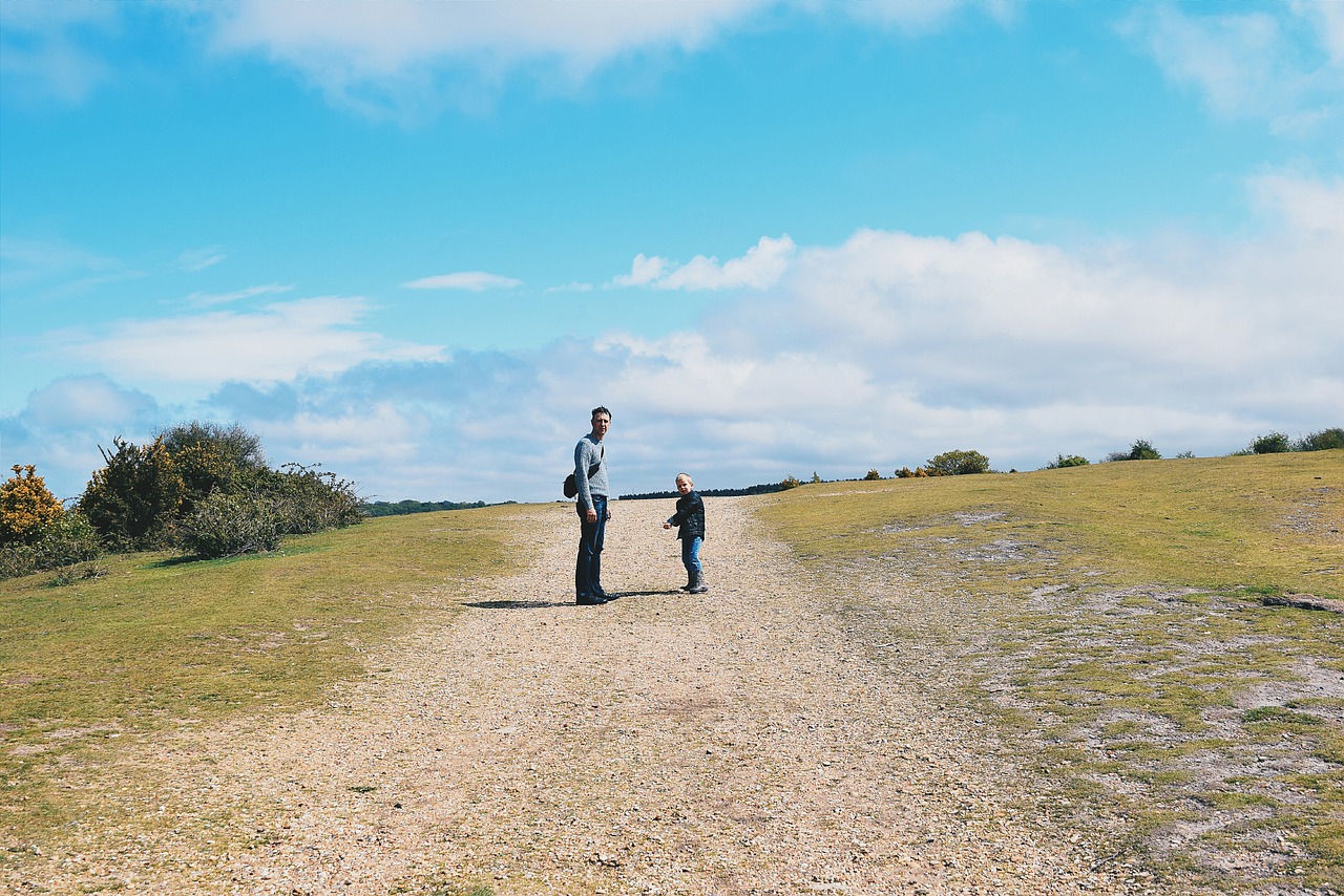 family father and son sky and clouds free photo