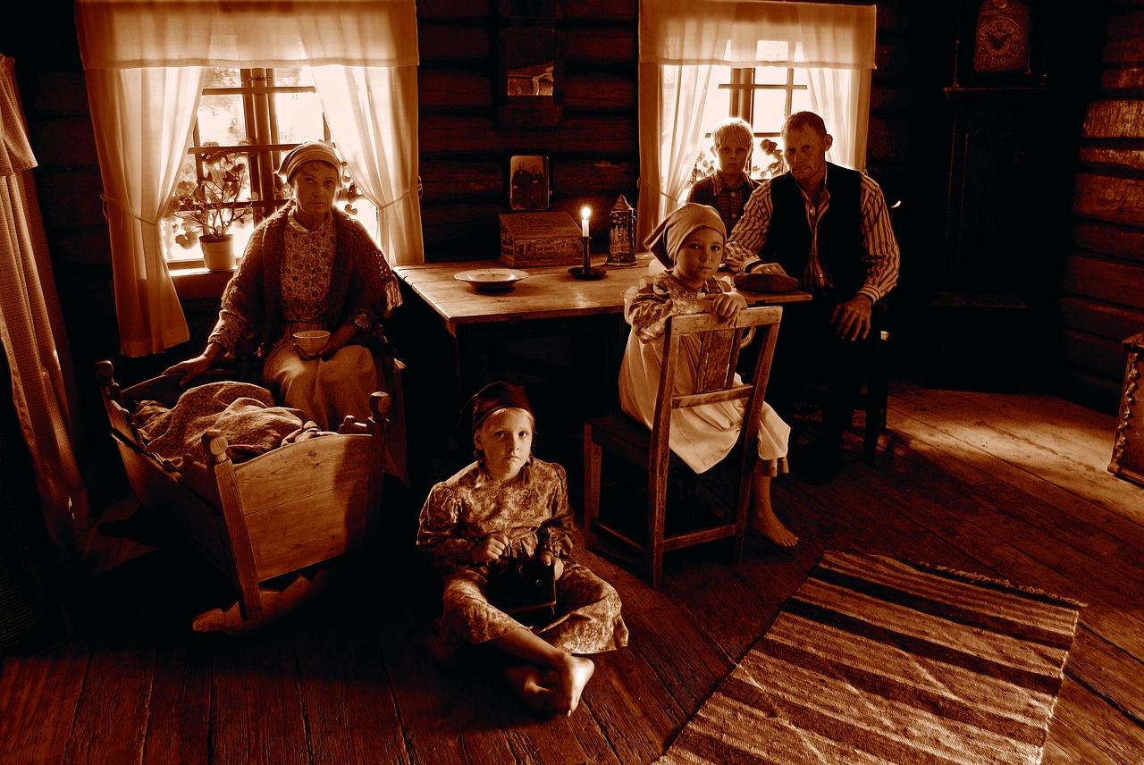 family gathered in the living room  1800 century  bruntonet free photo