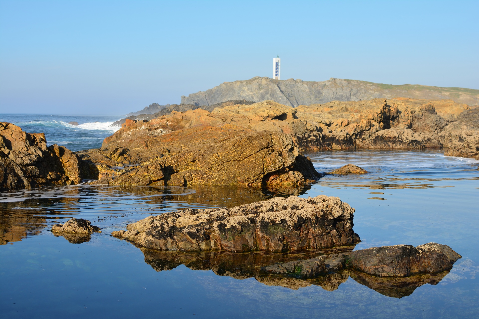 lighthouse coast sea free photo