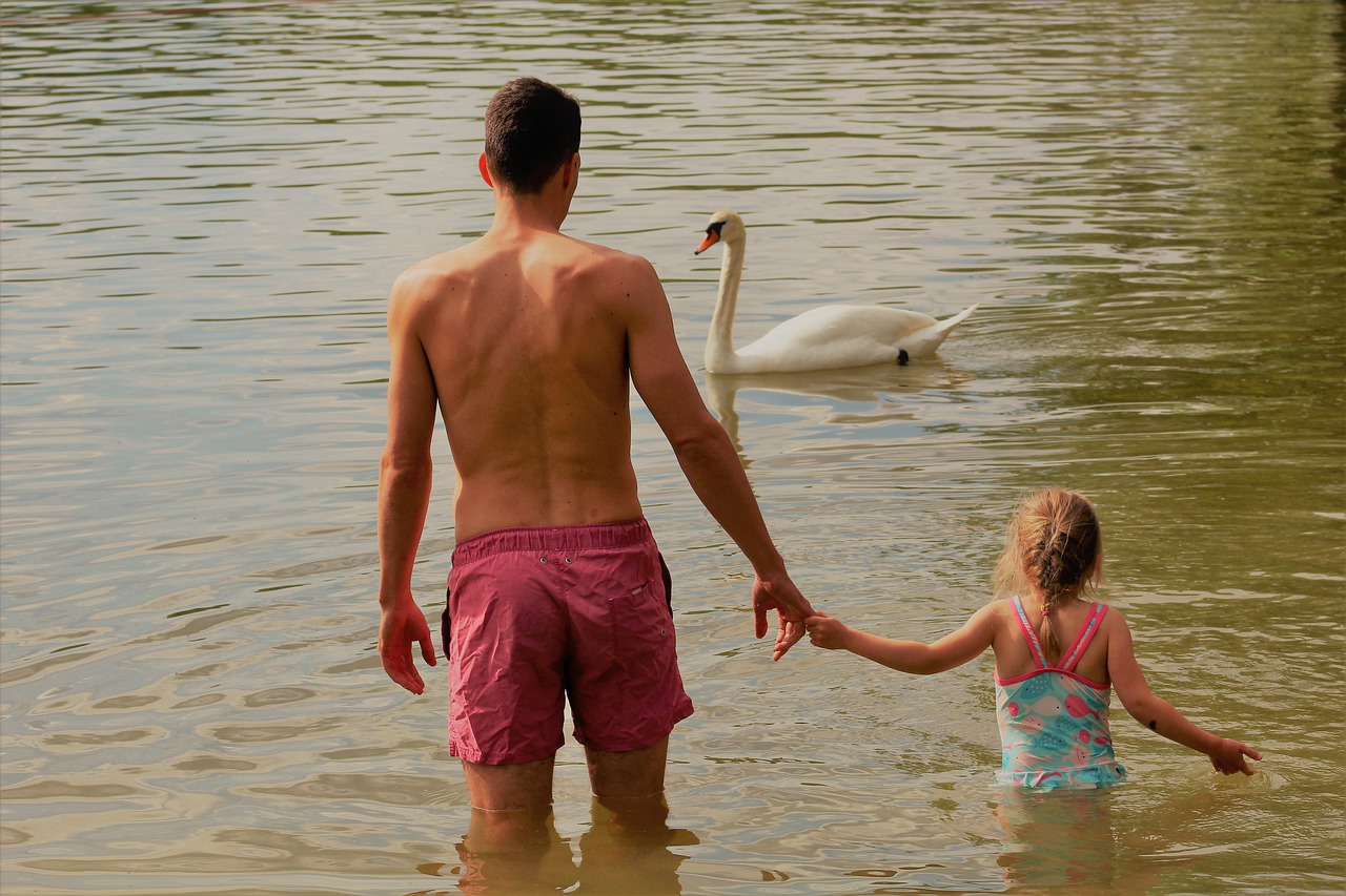 father  daughter  hand in hand free photo