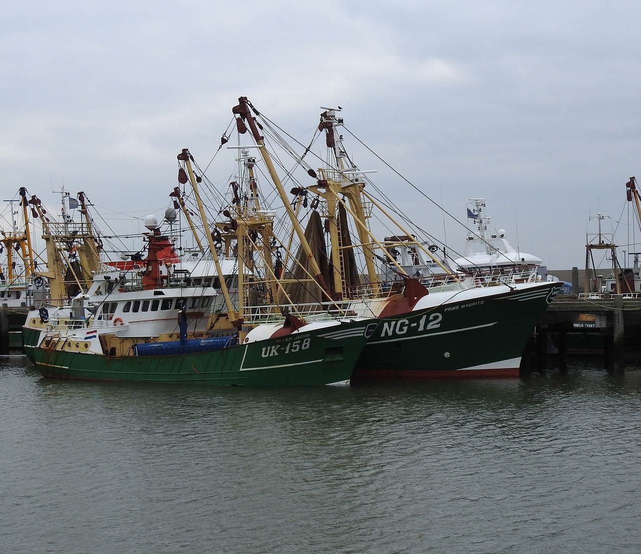 father and son trawler ship free photo
