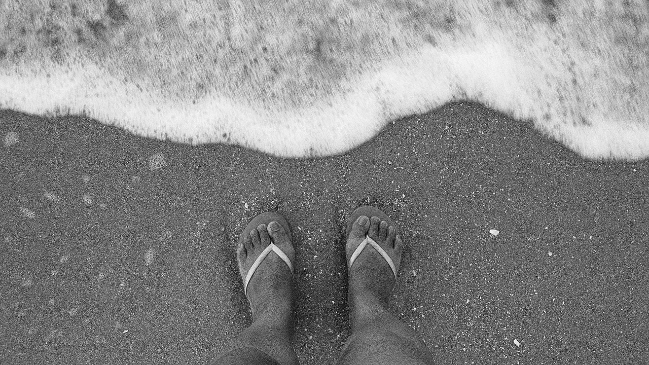 feet black and white sand free photo