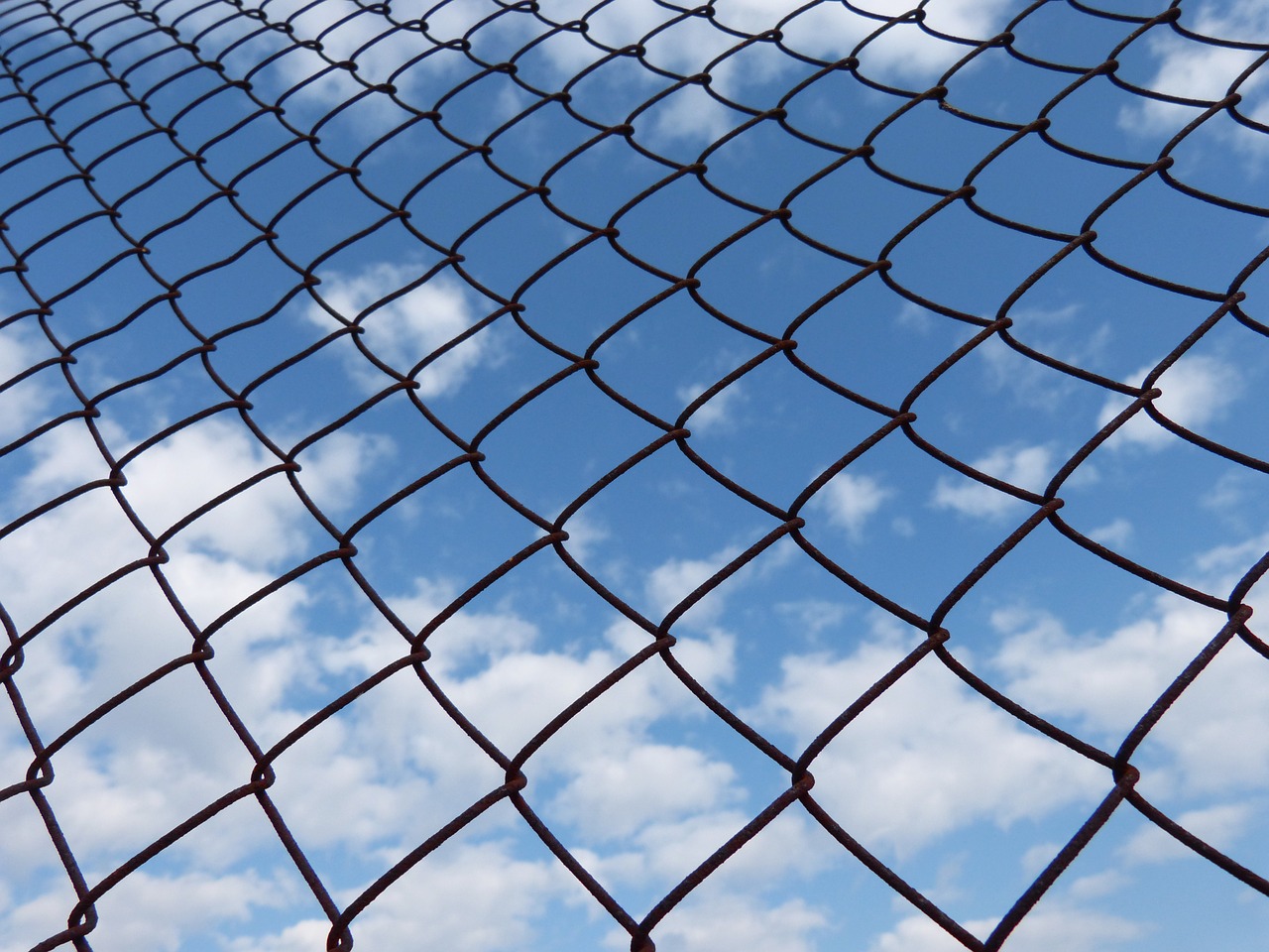 fence sky prisoner free photo