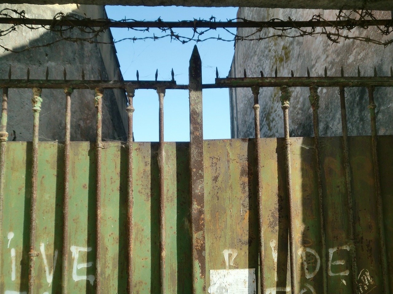 fence imprisoned barbed wire free photo