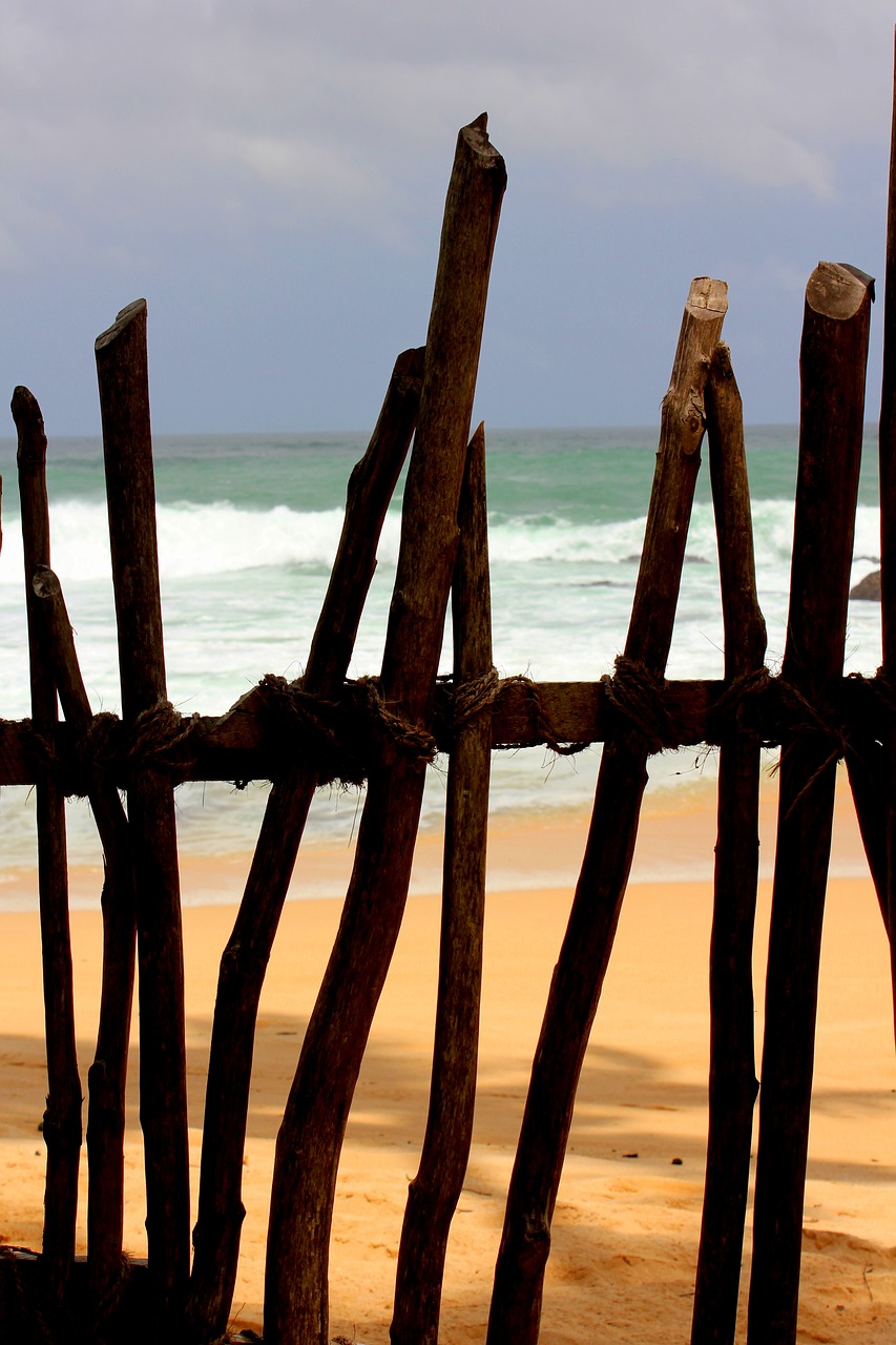 fence beach sand free photo