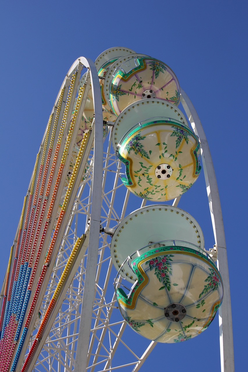 ferris wheel hustle and bustle year market free photo