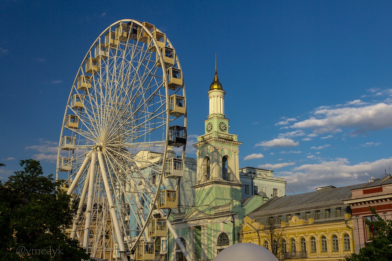 ferris wheel  clock tower  kiev free photo