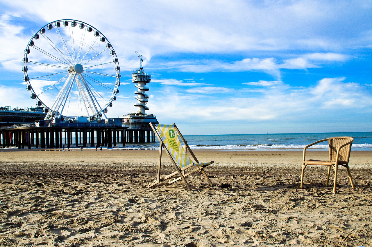 ferris wheel  beach  sea free photo