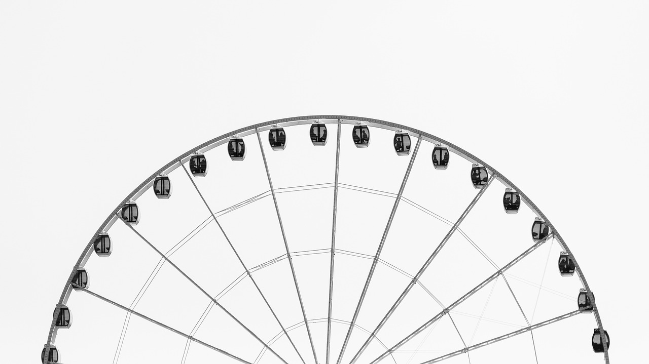 ferris wheel black and white sky free photo