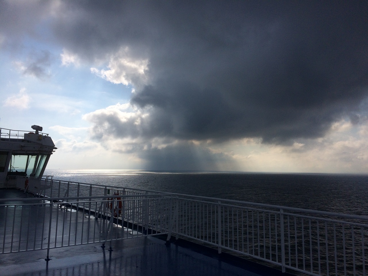 ferry heavy clouds rain free photo
