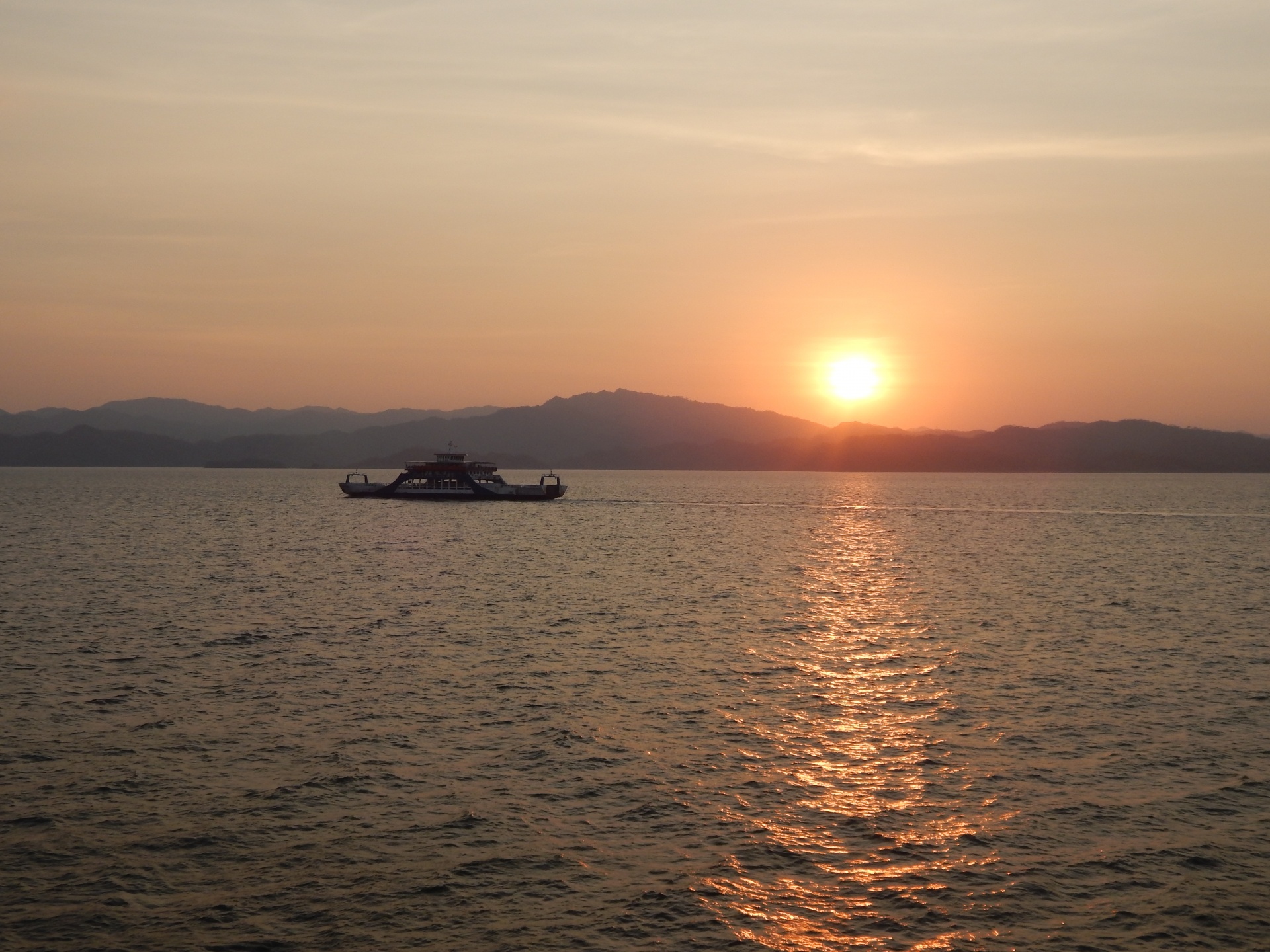 ferry at sunset reflection water free photo