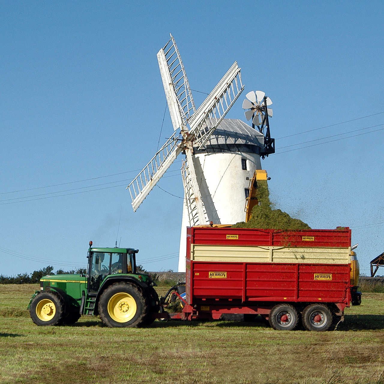 field  windmill  tractor free photo