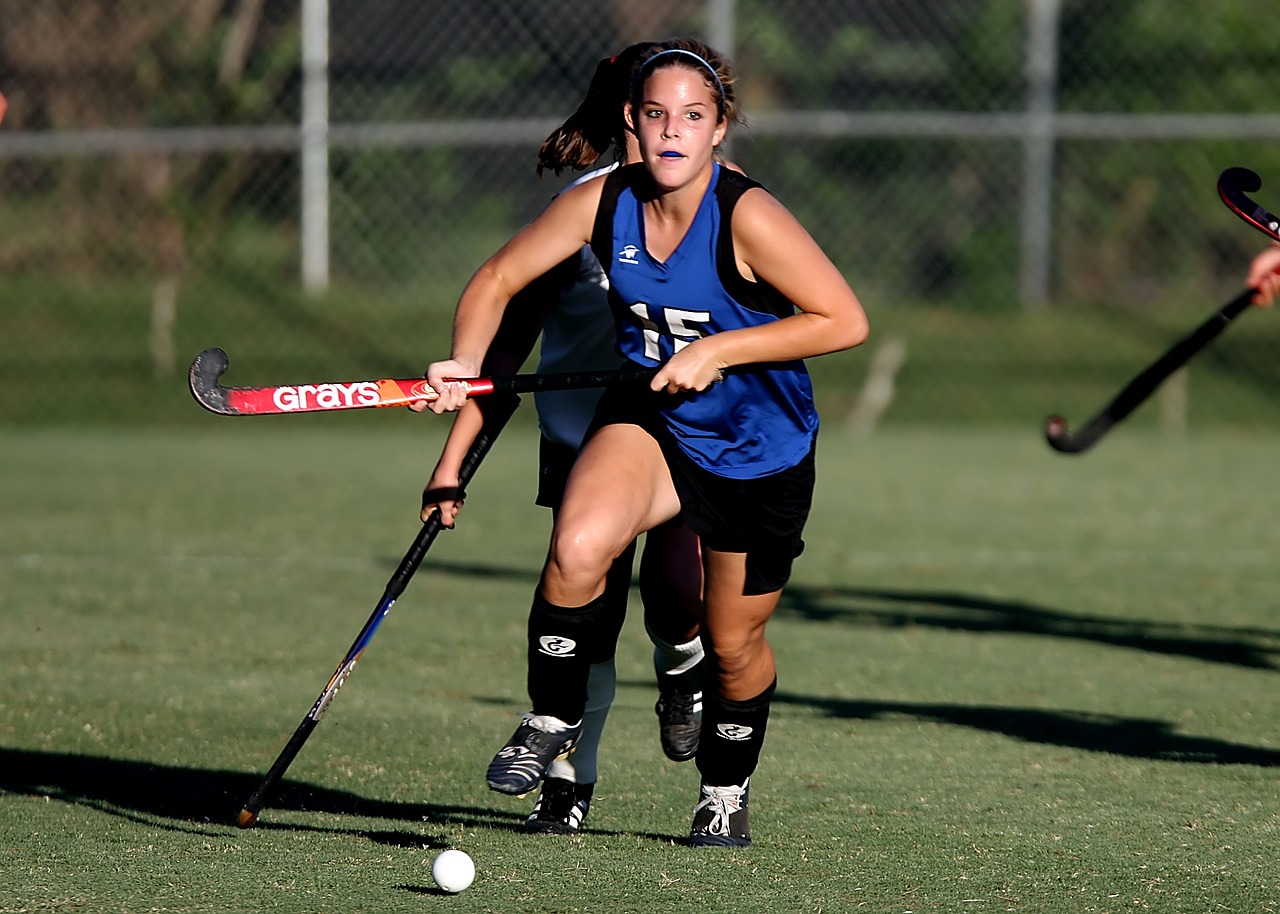 field hockey game action free photo