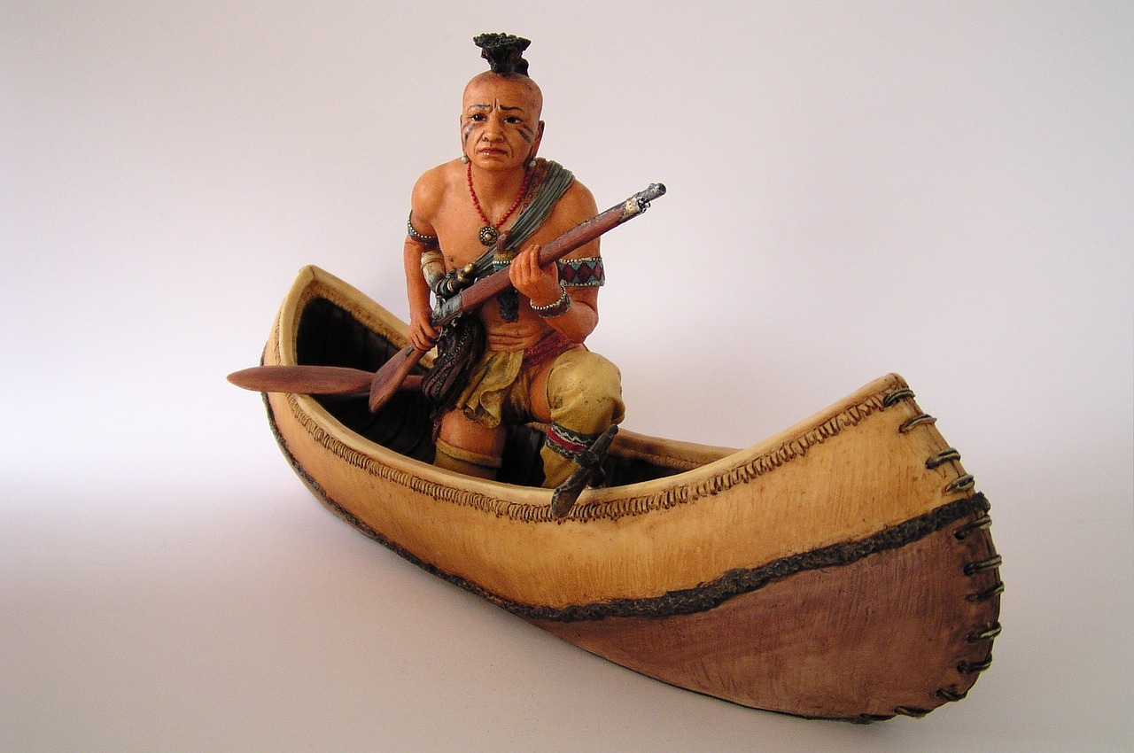 figure indians canoeing free photo