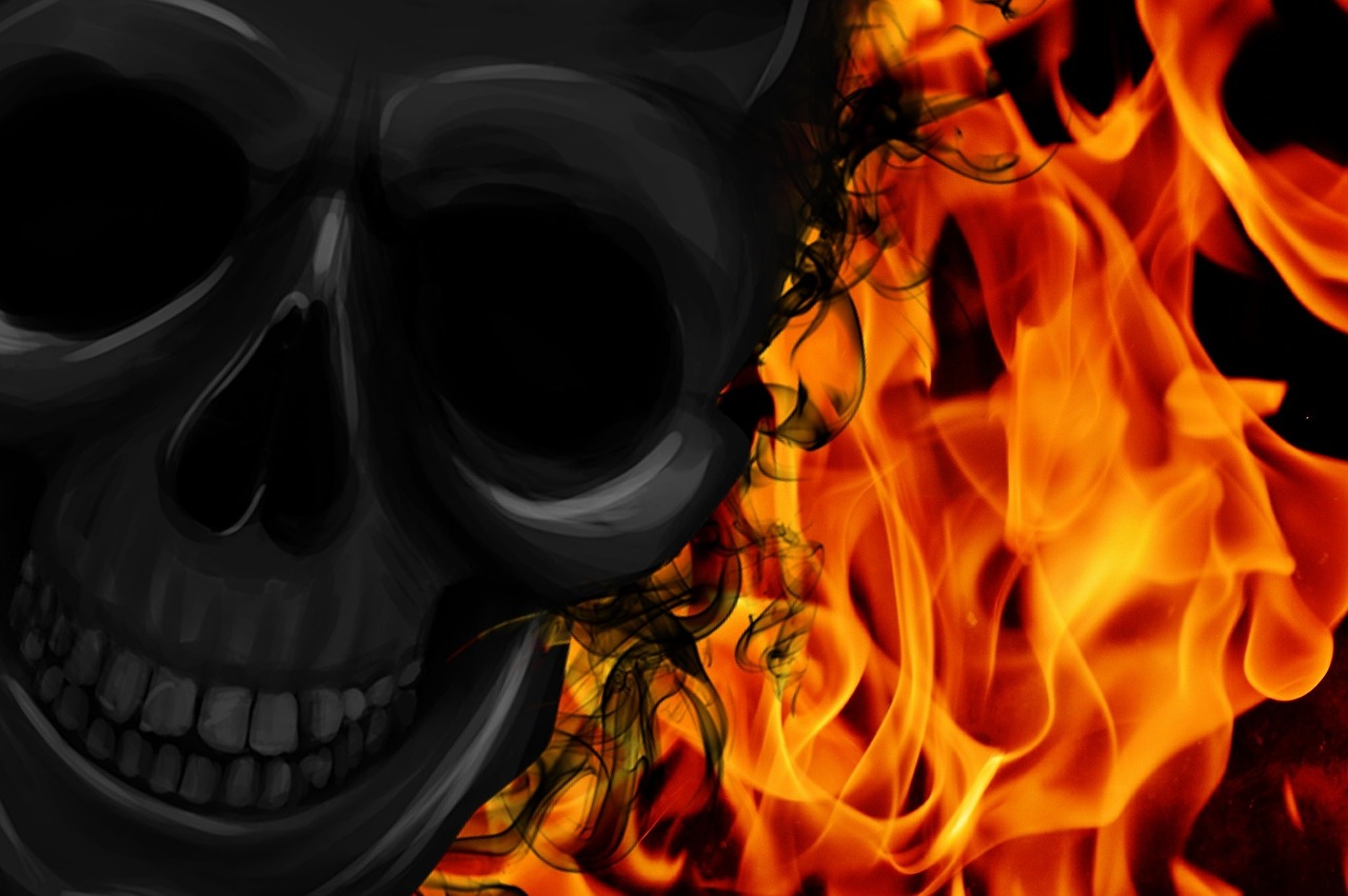 fire skull and crossbones creepy free photo