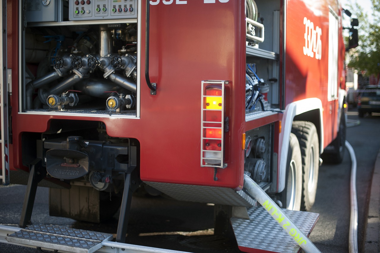 fire brigade  fire hose  fire truck free photo