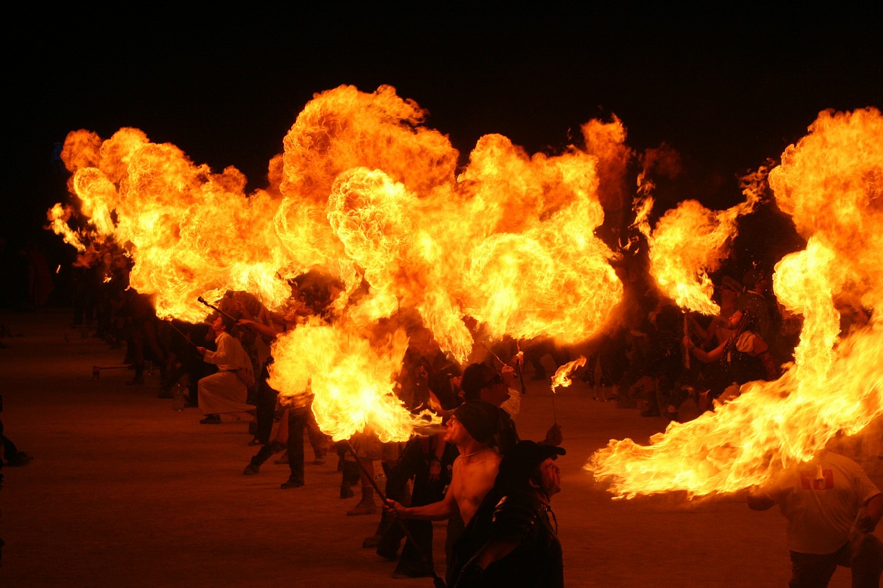 fire eaters burning man flames free photo