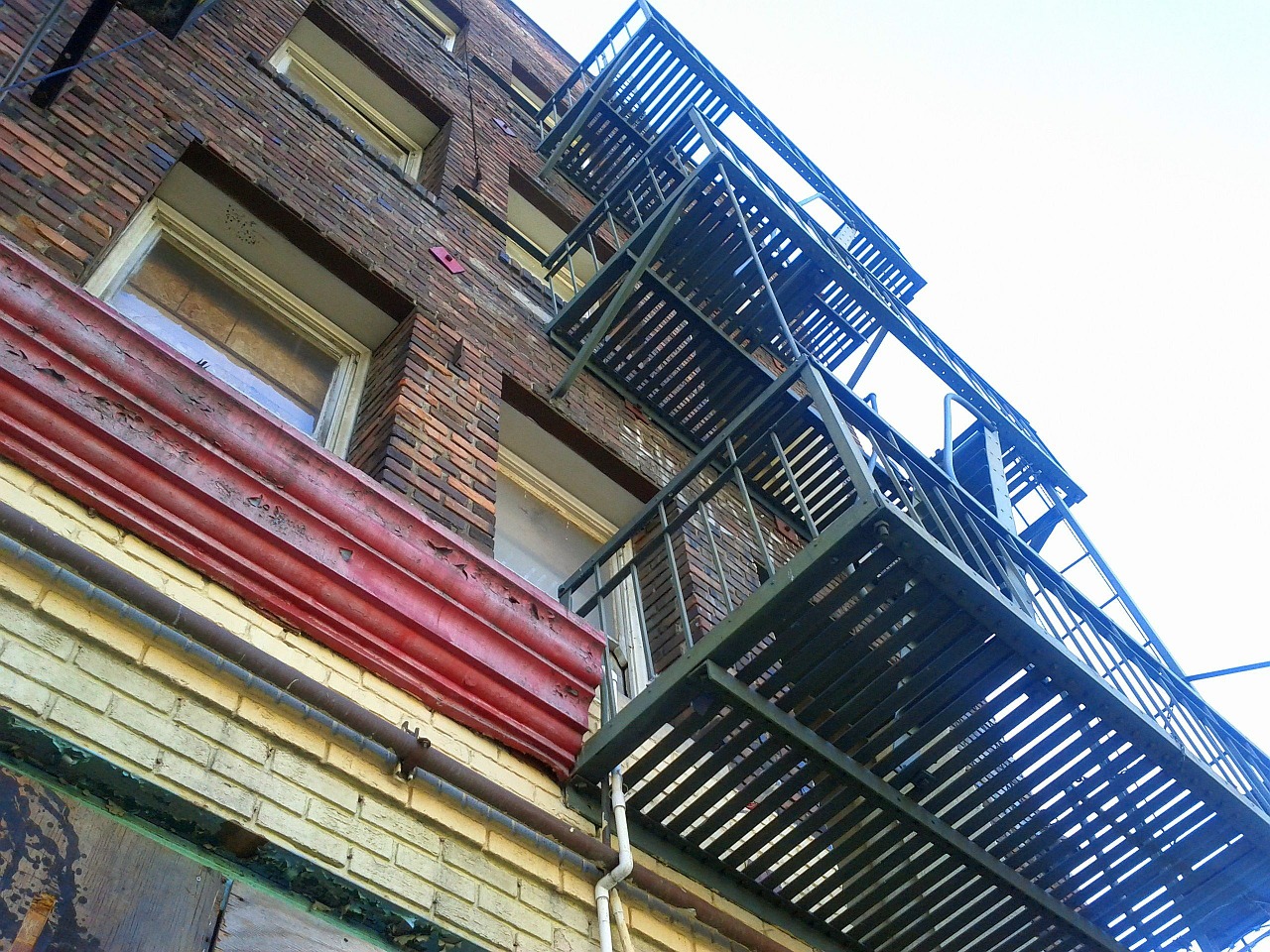 fire escape old building downtown free photo