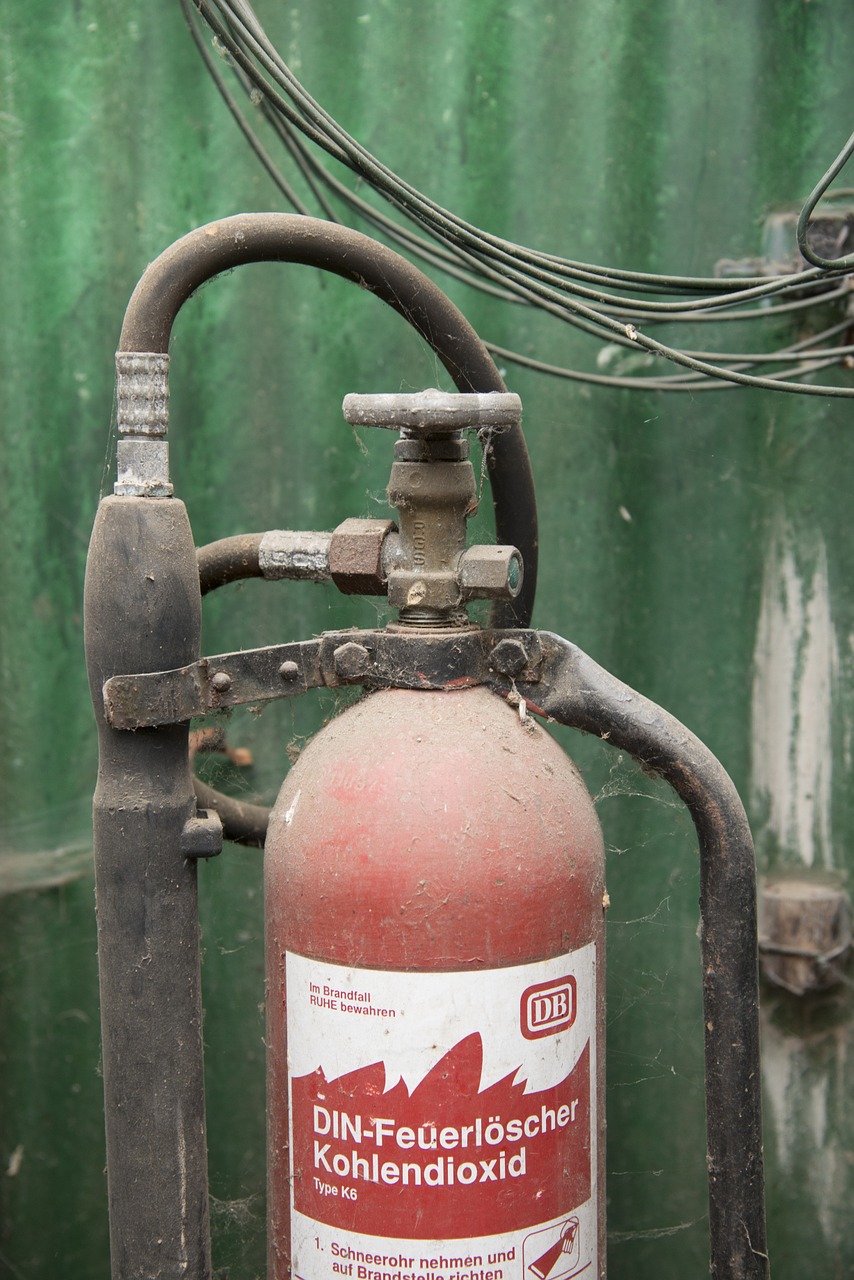 fire extinguisher red old free photo