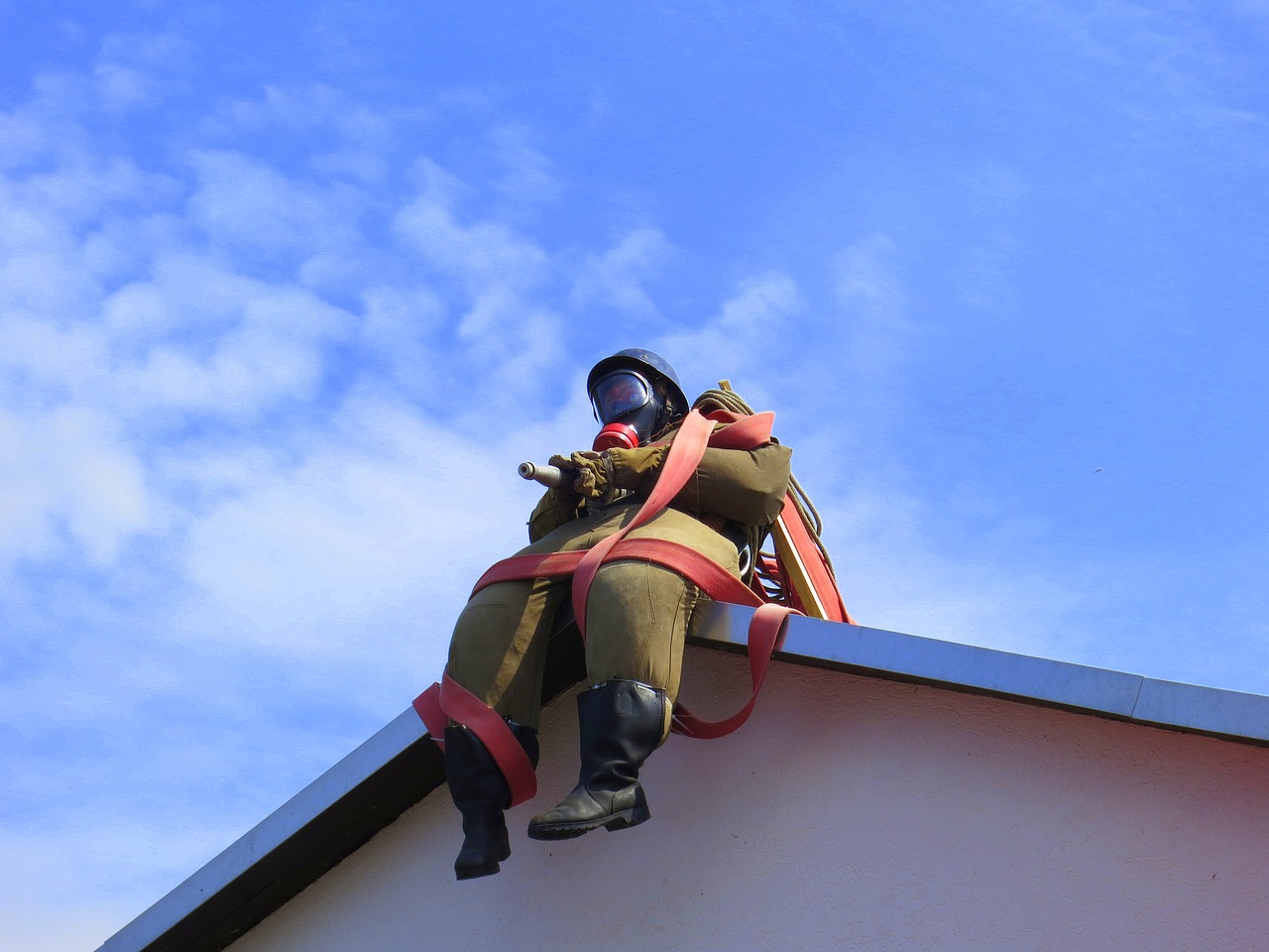 fire fighter roof figure fire free photo