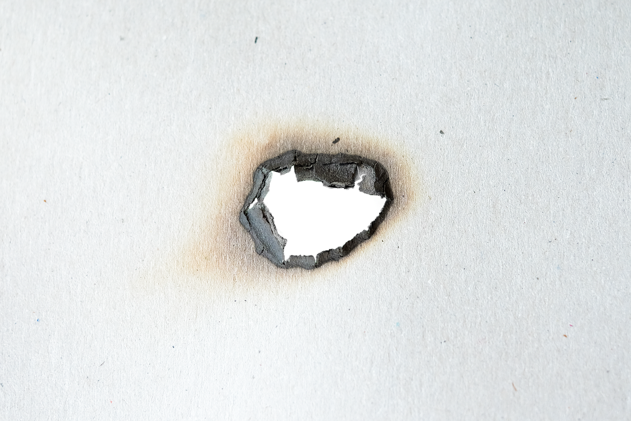 fire hole cardboard paper free photo