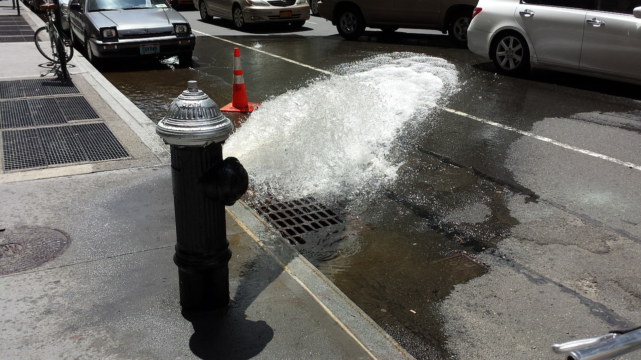 fire hydrant flowing water free photo