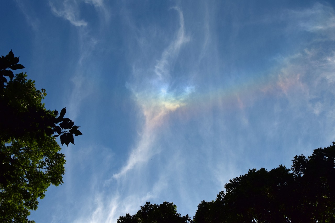 fire rainbow in the clouds rare early evening free photo