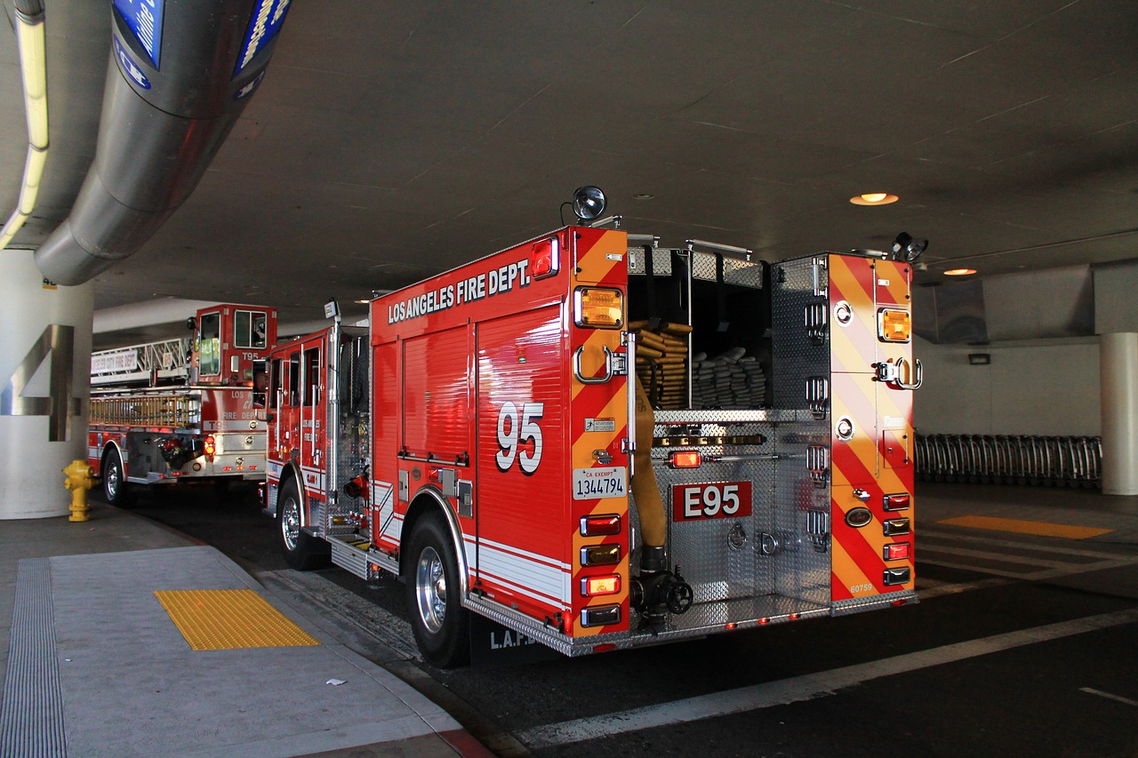 fire truck firefighters red free photo