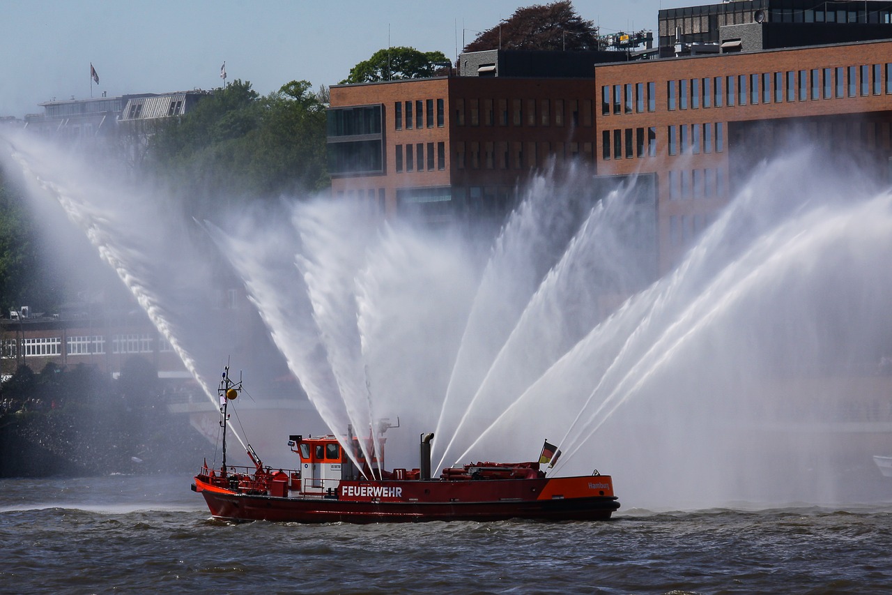fireboat fire ship water fountains free photo