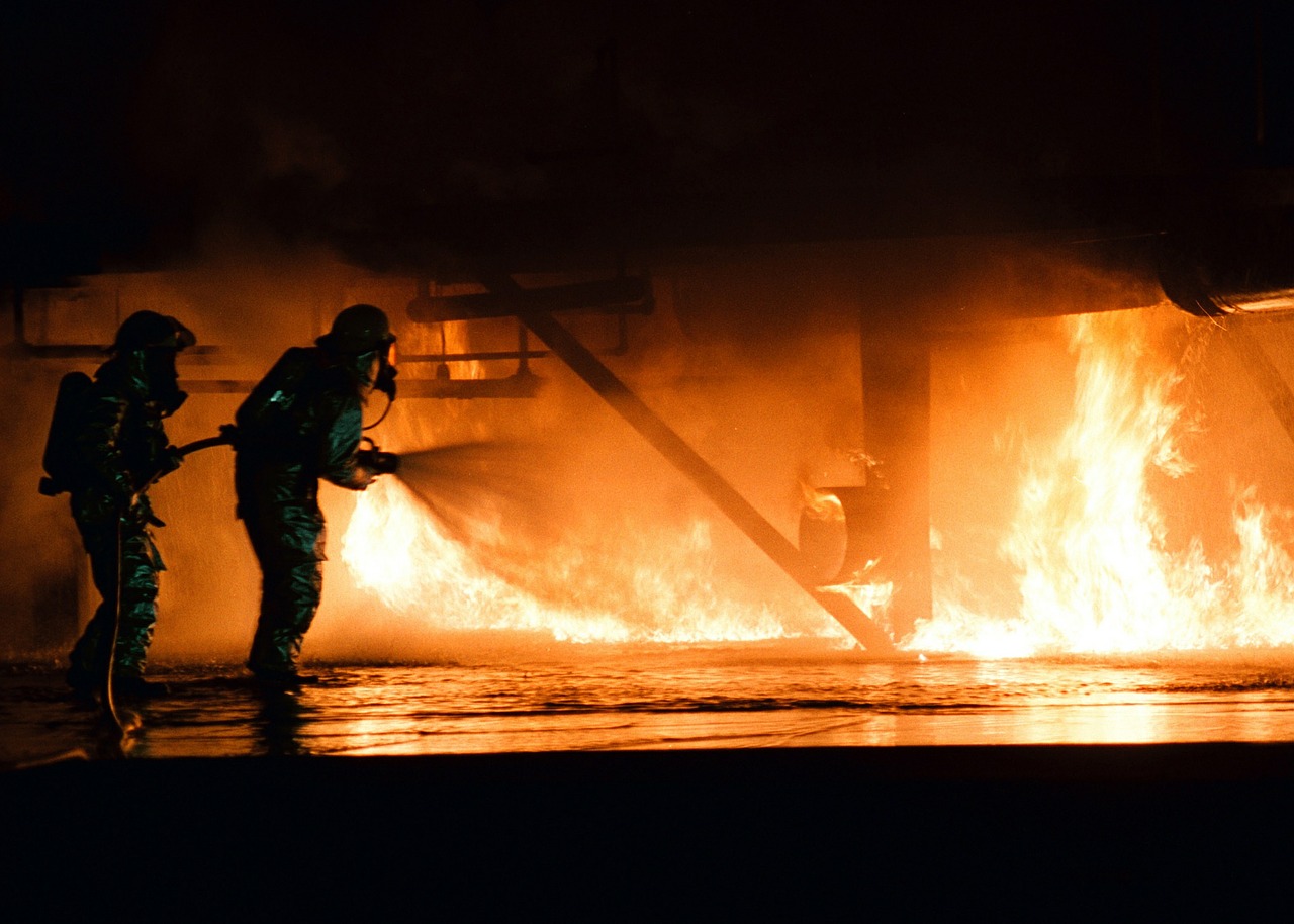 firefighter training simulated plane fire free photo