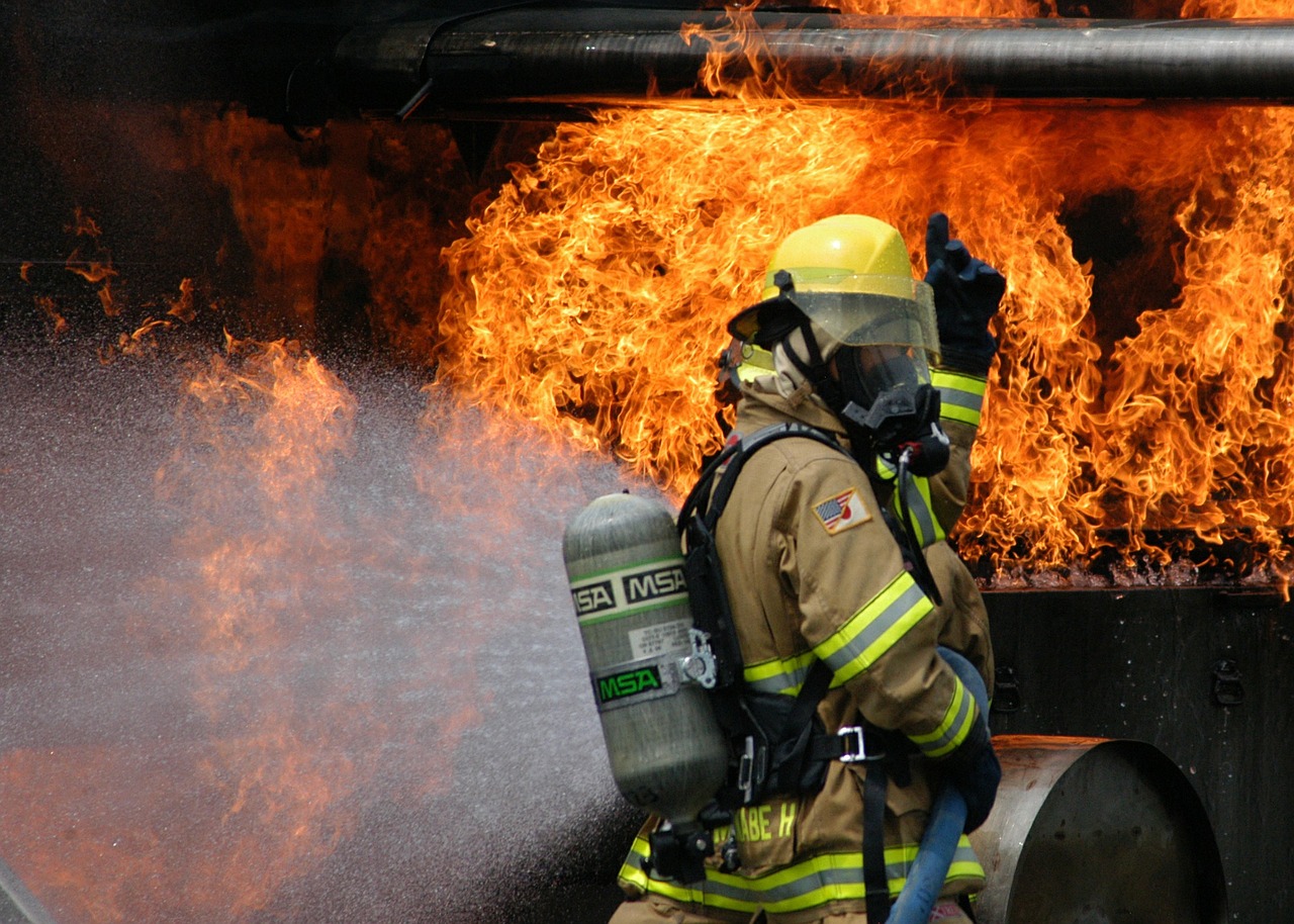 firefighter training simulated plane fire free photo