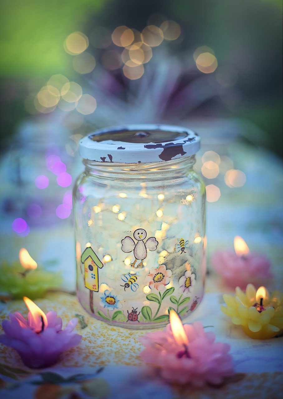 fireflies in jar  magical  colorful free photo