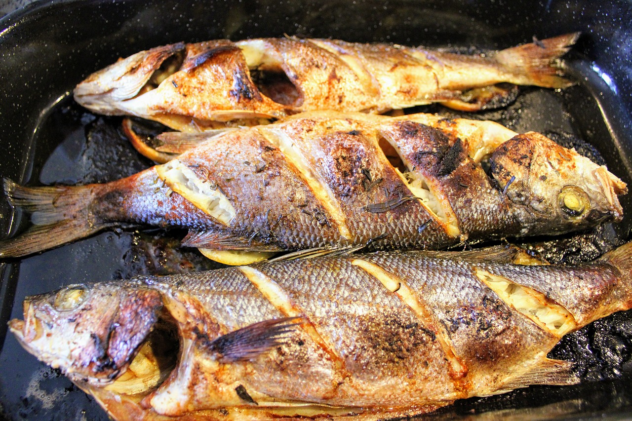 fish  oven baked sea bass  tasty free photo