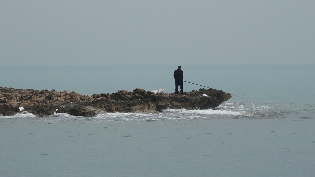 fisherman sea landscape free photo