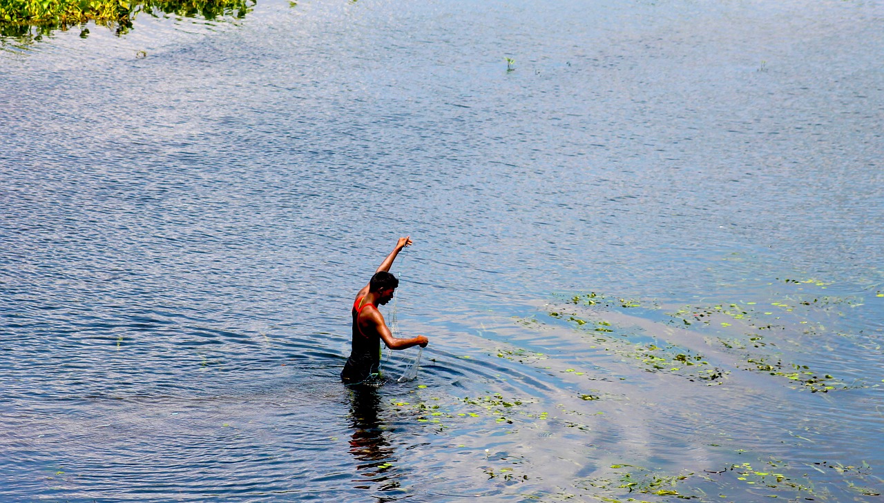 fisherman fishing river free photo