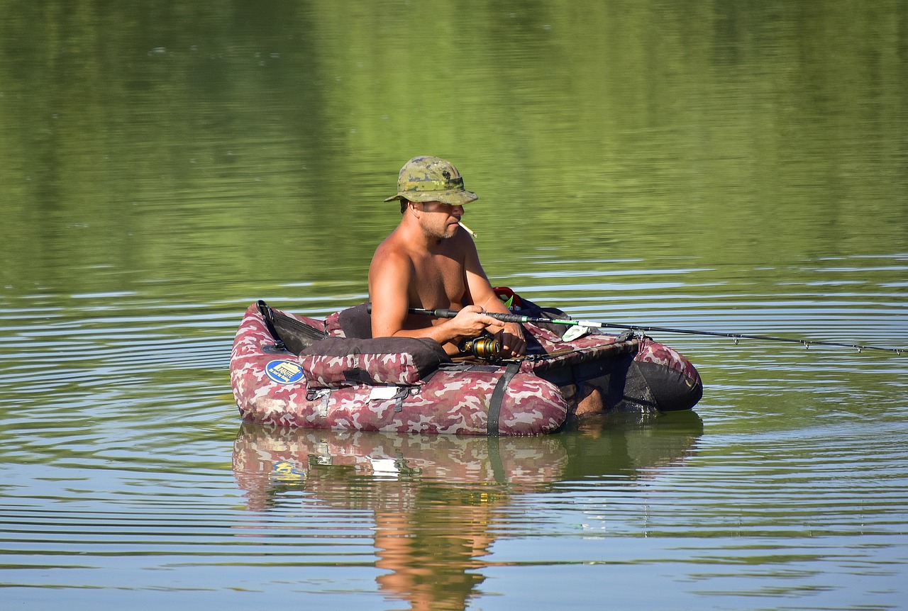 fisherman  fishing  river free photo