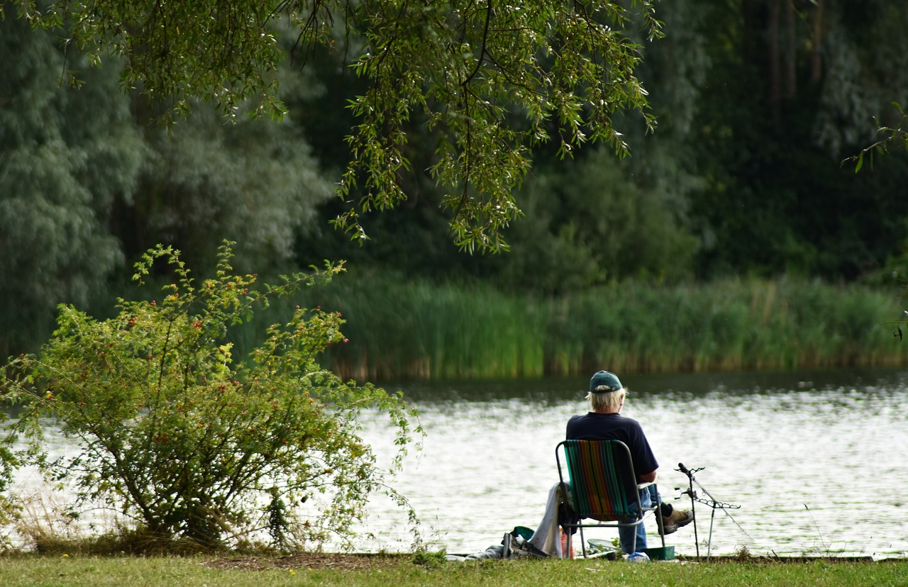 fisherman  fishing  bored free photo