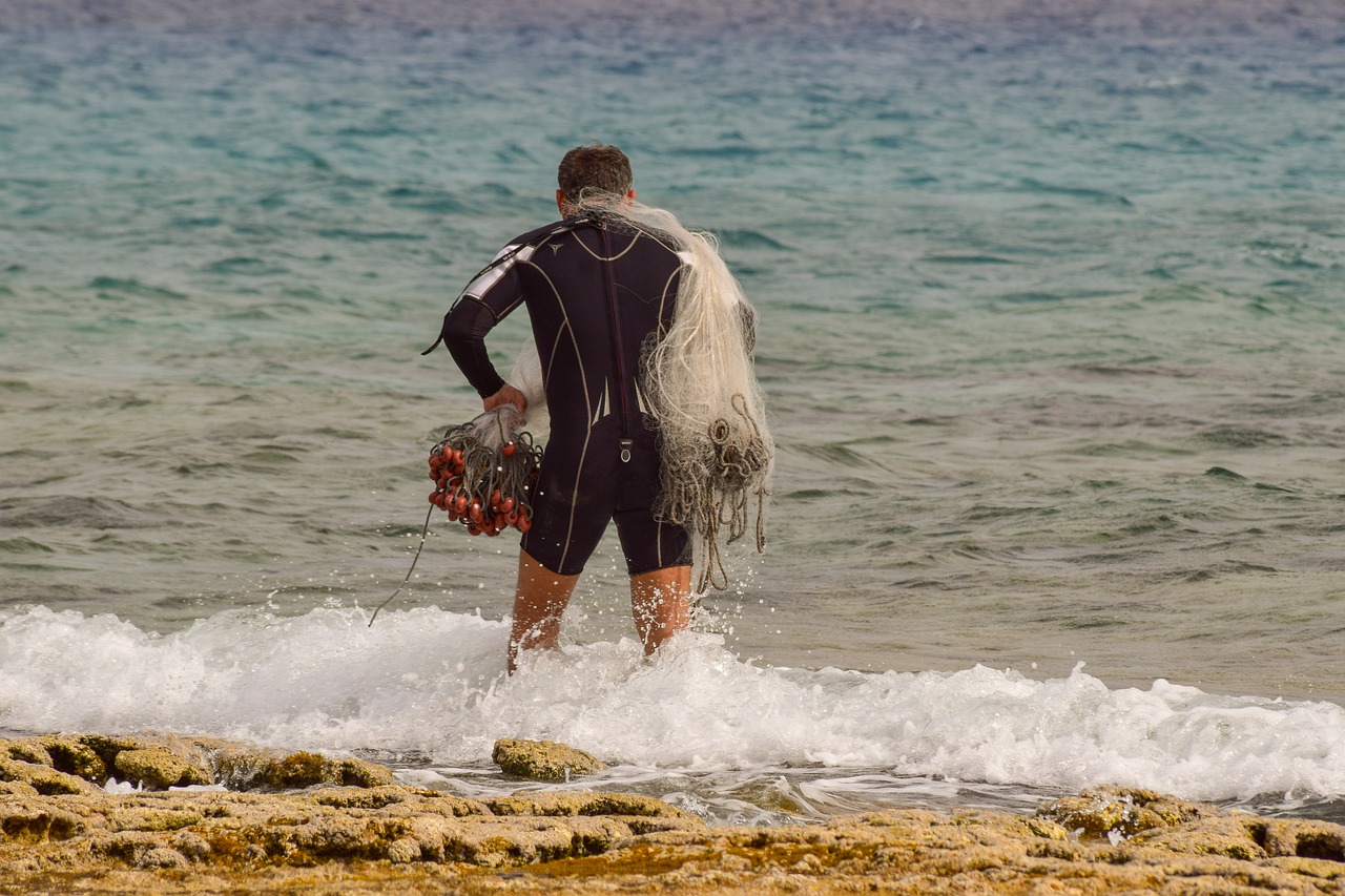 fisherman  sea  fishing free photo