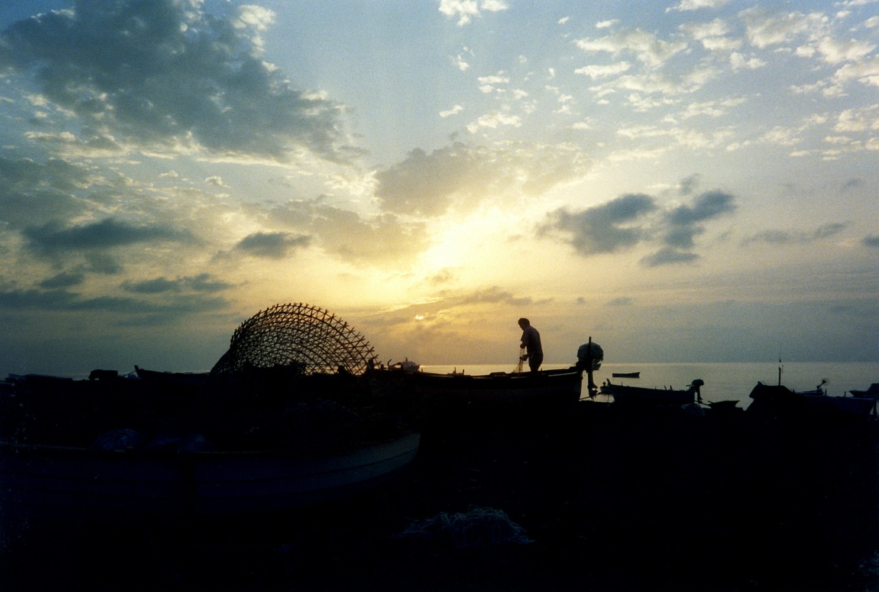 fisherman dawn sea free photo