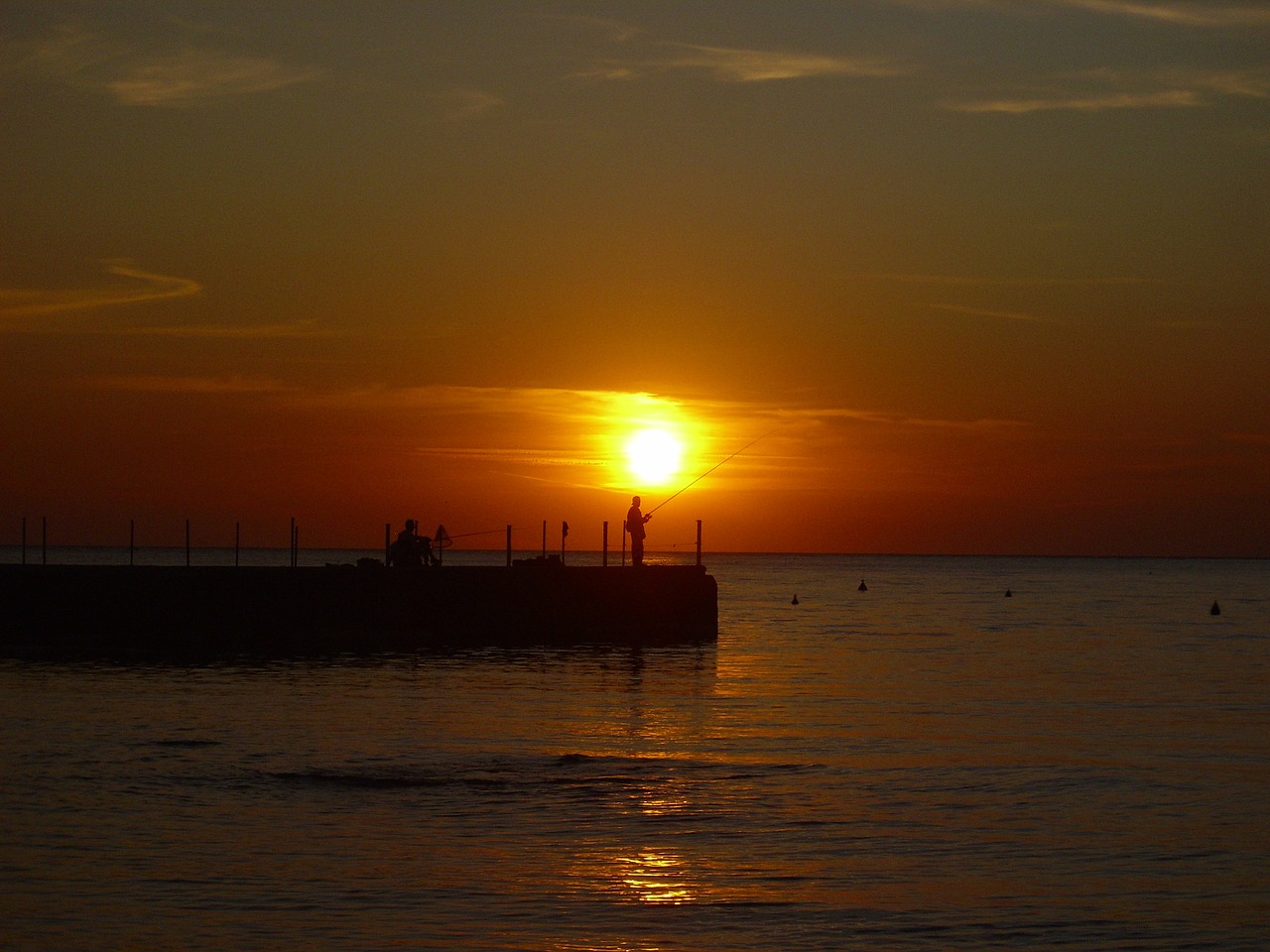 fisherman fishing jetty free photo