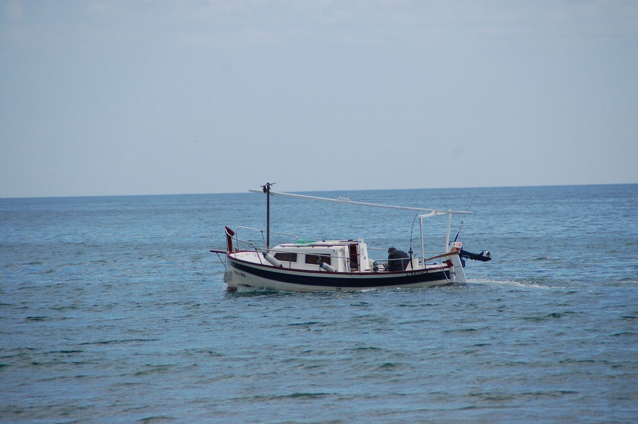 fisherman boat sea fishing free photo