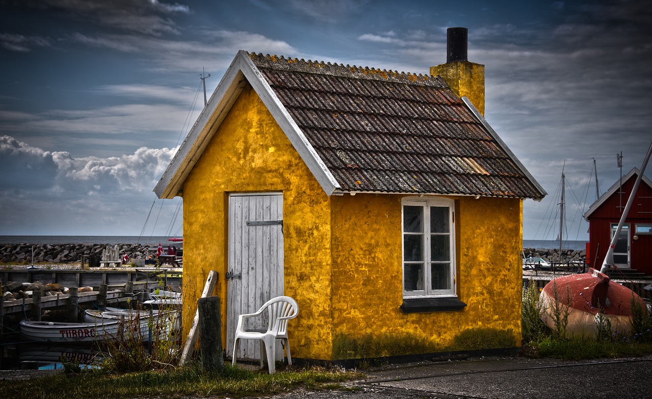 fisherman's house hut yellow house free photo