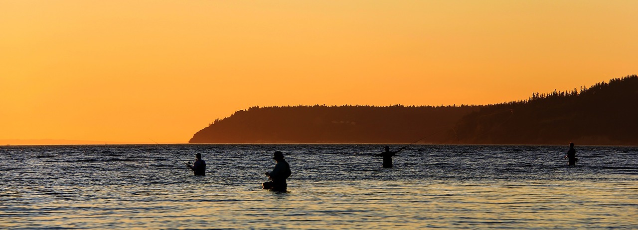 fishermen sunset water free photo