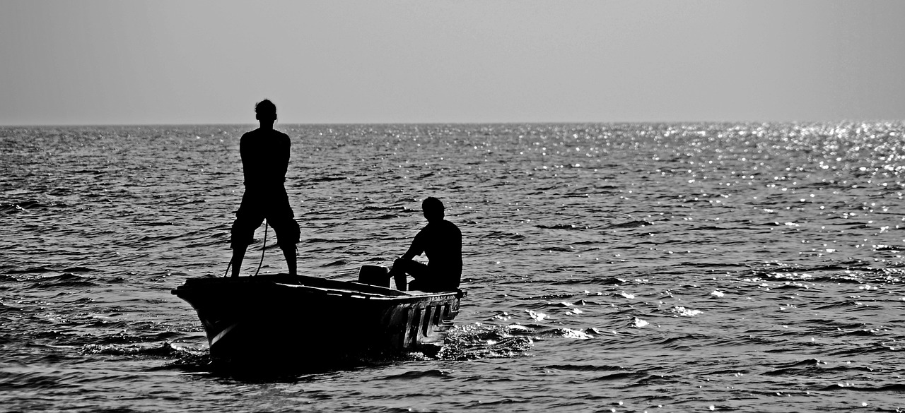 fishermen boat sea free photo