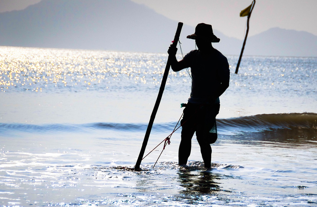 fishermen silhouette sunset free photo