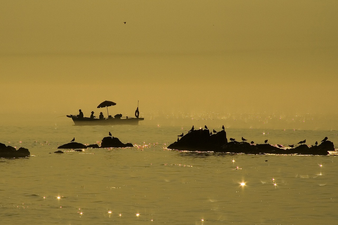 coastal island fishing boat free photo