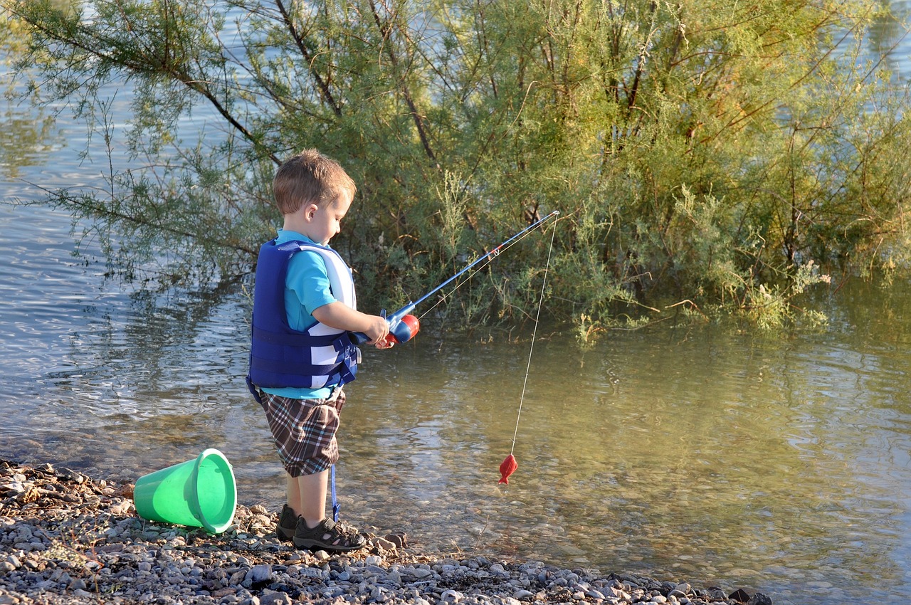 fishing child fisherman free photo