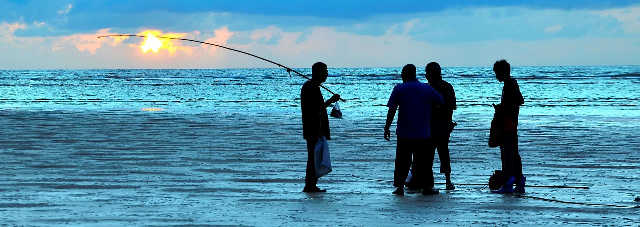fishing sunset fisherman free photo