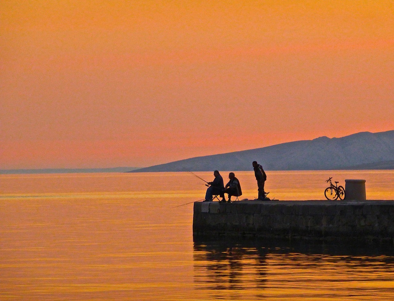 fishing sunset silhouette free photo